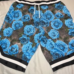 Mens athletic shorts with rose design.